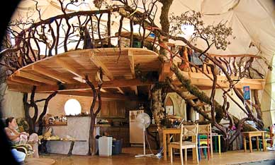 A loft built inside a geodesic dome home.
